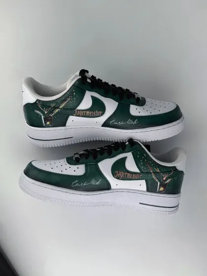 A top-down view of the finished Nike Air Force 1 custom-painted for Jägermeister. This showcases the detailed, high-quality artwork that serves as a lasting piece of merchandise from our live art events.