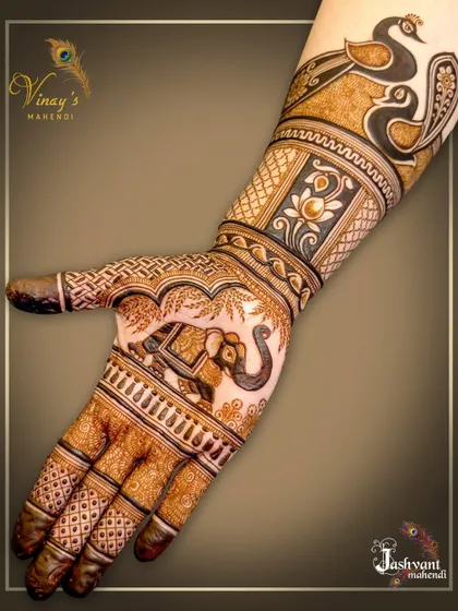 This series showcases a designer mehndi rich with fauna, including peacocks, swans, and elephants, blended with lotus flowers and traditional patterns for a full and festive look.