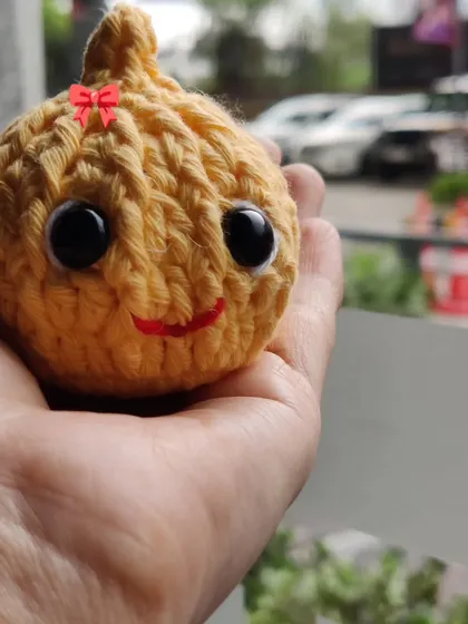 My award-winning Modak plushie, a cute and festive creation.
