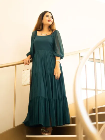 A lifestyle shoot for a fashion blogger on an elegant staircase. This type of photography is perfect for influencer collaborations and social media content.