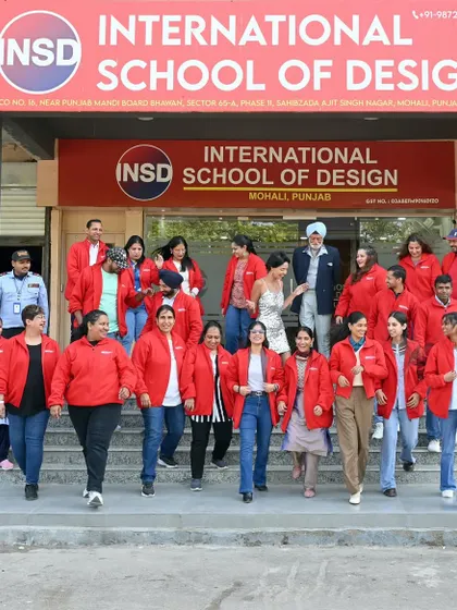 A full team photo for the International School of Design in Mohali. Capturing the energy of a large group in front of their institution helps build a strong brand identity.