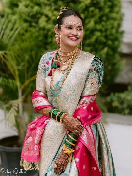 Another beautiful portrait of the bride, Kanchan, capturing her happy and serene expression.