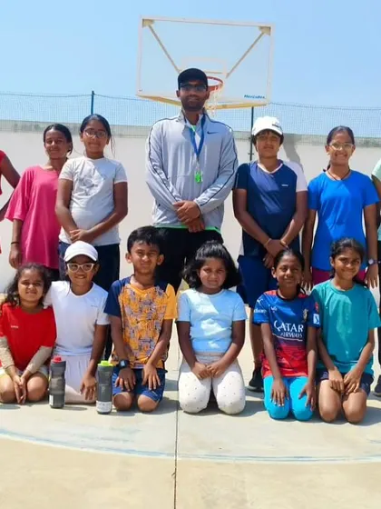 A group shot with my students at the 2024 summer camp. I work with kids of all ages, helping them develop their basketball IQ and on-court abilities.