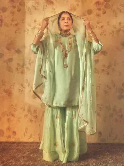 Neena Gupta embodying her character in a Raw Mango ensemble. Styling for narrative projects like this involves a deep dive into the story and characters to create authentic looks.