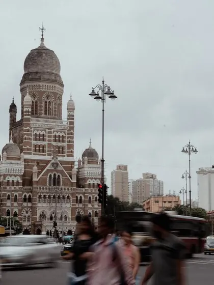 A collection of day and night shots of the Brihanmumbai Municipal Corporation (BMC) building, another iconic piece of Gothic architecture. The images capture its grandeur from various angles and in different lights.