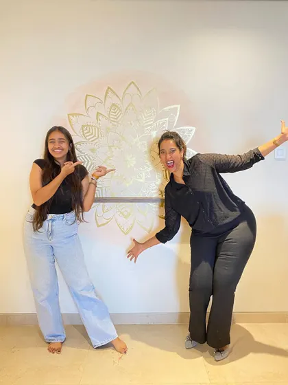 The golden magic. A fun photo with my happy client and her new gold leaf mandala mural.