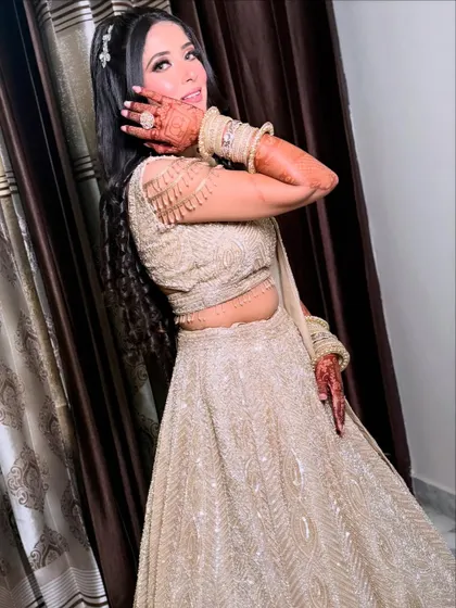 A playful and happy pose from the engagement bride, showing off her stunning ring and beautiful smile.