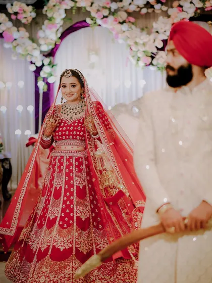 The bride's entry at a beautiful Sikh wedding in Delhi. A moment filled with anticipation and emotion.