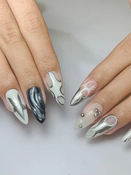 This futuristic set is all about texture and shine. We used different chrome and metallic effects in silver and gunmetal to create a truly one-of-a-kind, edgy look.