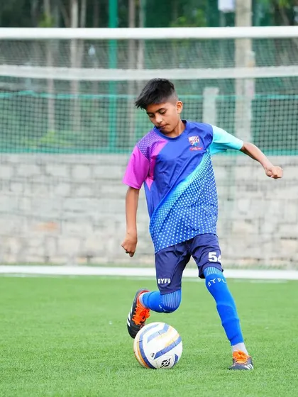 A player strikes the ball with precision, a skill honed through countless hours of practice.