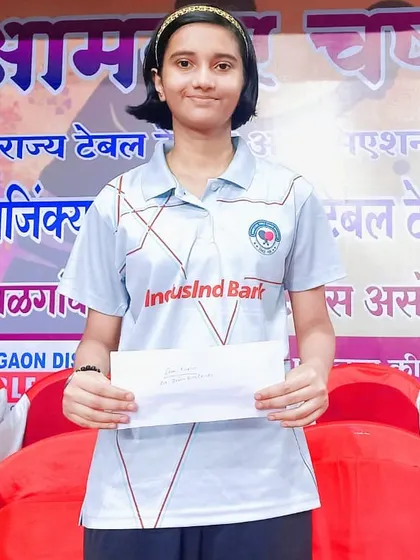 Anvi Thorat displays her prize after winning her third bronze medal in the Under-15 girls' category at the Maharashtra State Ranking Tournament in Jalgaon.