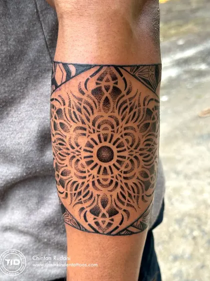 A healed shot of the geometric mandala armband.