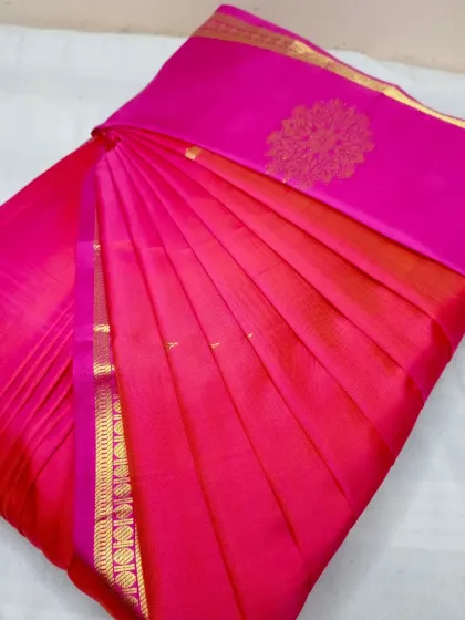 A simple, elegant pink saree with perfectly defined pleats. This is the standard of quality I provide with my saree pleating and box folding service.