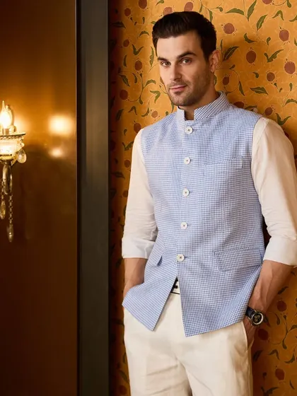 A perfect fit, tailored just for you. This pastel blue waistcoat is a versatile addition to any gentleman's wardrobe.