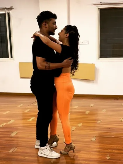 A quiet moment of connection during a Zouk practice. This dance style is known for its deep connection and musicality.