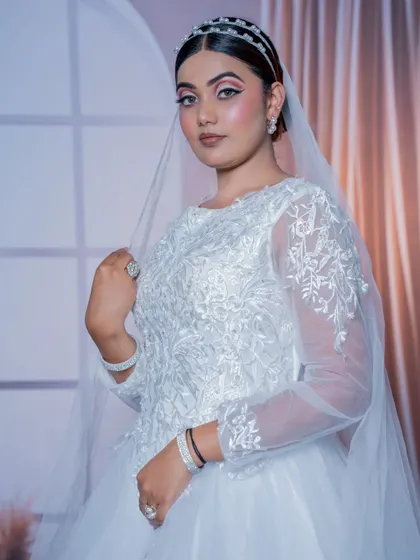 The complete look with the veil. I ensure the makeup is perfectly balanced to look beautiful both with and without the veil.