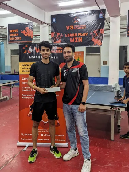 Presenting an award to one of the winners. The success of these tournaments is thanks to the enthusiastic participation from players across the region.