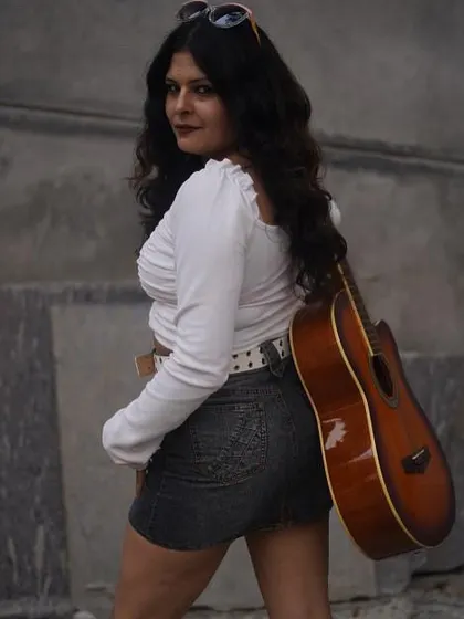 A back view of the same outfit, showing how a simple look can be powerful and confident.