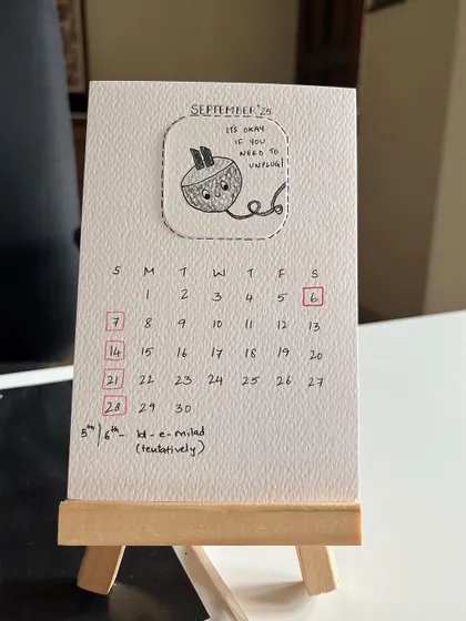 September's doodle is a reminder that "It's okay if you need to unplug!".