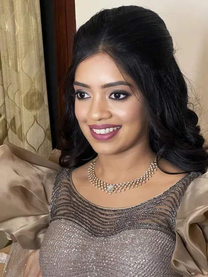 This close-up shows the final glamorous look. The smokey eye, defined brow, and perfect lip are all skills that you will develop and refine in my training program.