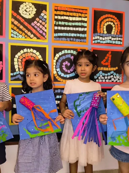 A group of our youngest artists showcasing their vibrant jellyfish. Each one has a unique personality, just like its creator.