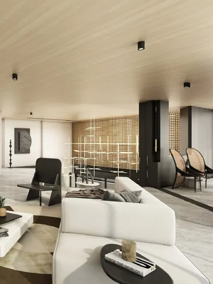The family living space in the 'Trapezoidal House' uses a refined monochrome palette and an oak veneer ceiling to evoke sophistication. The open-plan layout fosters fluid connectivity between different zones, centered around a sculptural coffee table.