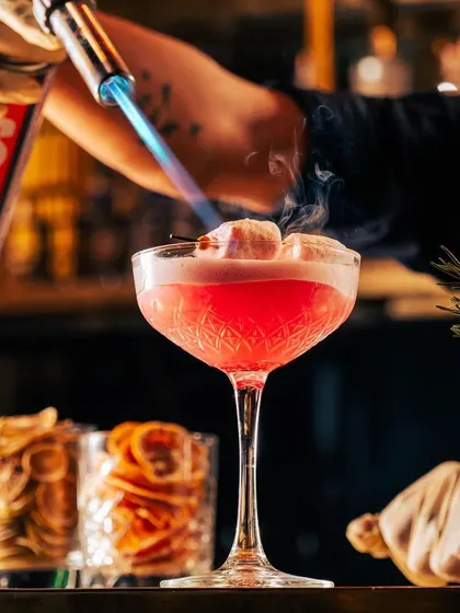 Elevate your day with a tantalizing selection of cocktails. This torched marshmallow cocktail is a spirited escape into pure indulgence.
