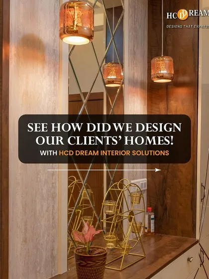 A glimpse into one of our client's homes, showcasing a stylish entryway with amber-colored pendant lights and a mirrored wall that adds depth and light.