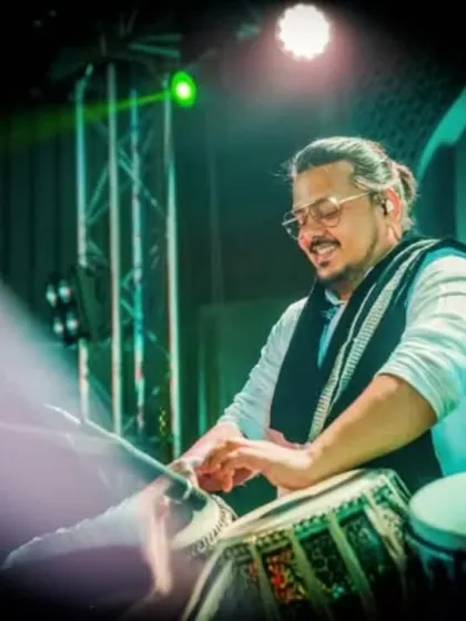 Our percussionist, adding the essential rhythmic texture to our sound.