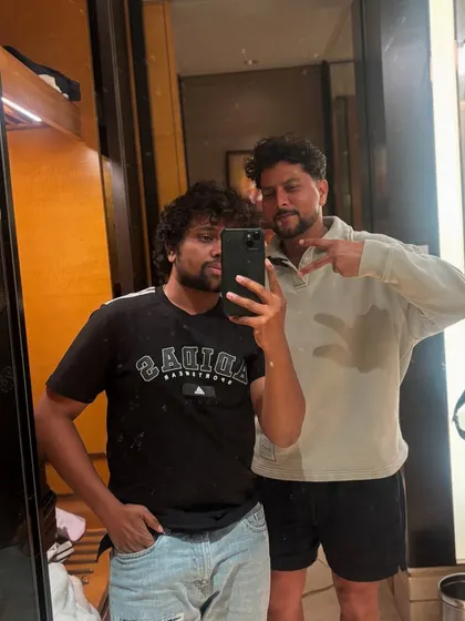 Sharing a moment with Kuldeep Yadav after a haircut session. I make sure my clients leave feeling and looking their best.