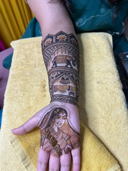 A closer look at the bride's portrait from a full bridal mehandi set, showing the fine lines and shading that bring the design to life.