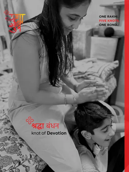 This quiet moment of care represents the 'Shraddha Bandhan', the knot of Devotion. It’s for a love that is steady, simple, and never needs a reason, staying constant as you grow.
