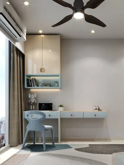 A minimalist study corner in a child's room, featuring a floating desk with light blue drawers and a small overhead cabinet, perfect for a clean and uncluttered look.