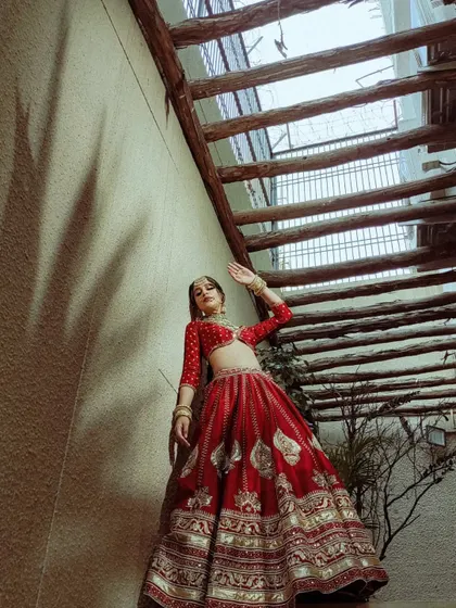 Another perspective of the Aafreen bride, showcasing the full skirt and the play of light and shadow.
