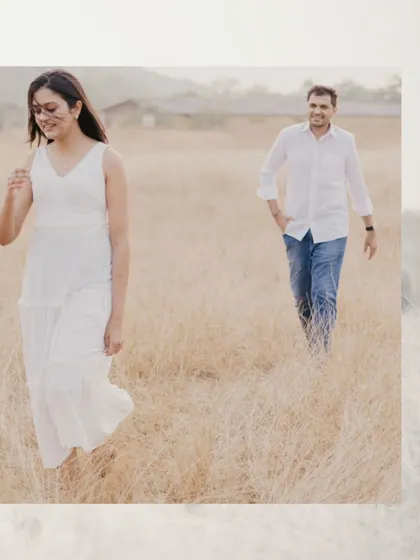 A candid walking shot during a golden hour pre-wedding session. The soft light and natural movement result in a relaxed and authentic portrait that tells a story.