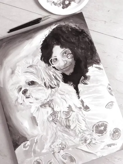 A close up of the finished black and white pet portrait. I focus on capturing the texture of the fur and the light in the eyes to create a realistic and soulful representation of the animal.