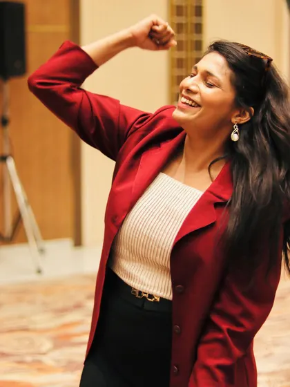 A moment of pure joy and energy during a team-building activity. I believe in leading by example to get the crowd excited and involved.
