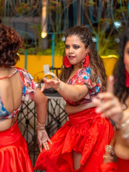 A mid-performance shot showing the focus and precision of our dancers. Each member is aware of her position and timing, which is key to a flawless group routine.