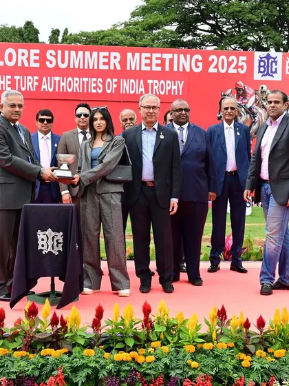 The Turf Authorities of India Trophy is presented to the winning connections of Inspire by Mr. G. Venkatesh.