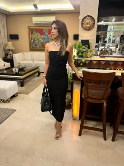 Ready for a night out in a classic black strapless dress. A simple, elegant piece that is always in style.