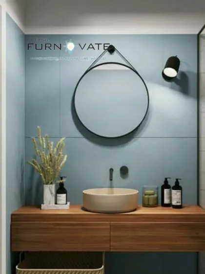 A modern bathroom concept with a vessel sink on a floating wooden vanity. The round mirror and minimalist fixtures create a clean and stylish look.
