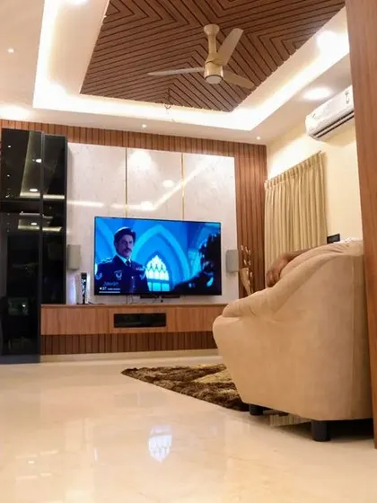 A duplicate image of the well-designed TV unit in the Velachery apartment.