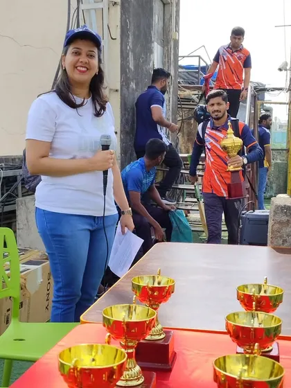 Hosting isn't just for formal stages. Here I am bringing the energy to a corporate cricket tournament, managing the awards presentation and making sure the team-building event is a huge success.