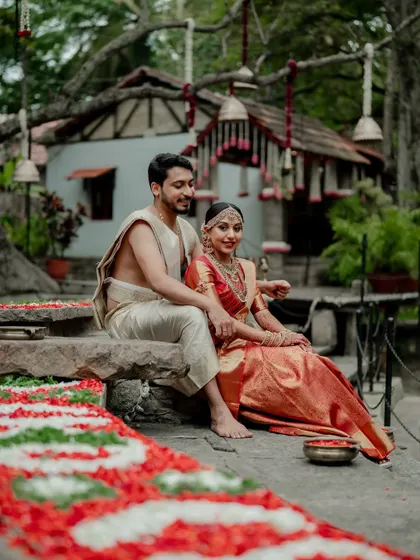 A moment of quiet connection amidst the grandeur of The Tamarind Tree. We love using the venue's stunning architecture to frame our couples, creating a story of romance and tradition.