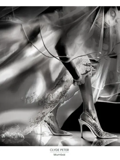 I believe wedding cinematography is an art form. This black and white shot, which won a Fearless Award, captures the quiet, artistic details of a wedding day. It’s about finding beauty in the small moments, like the bride adjusting her garter, and turning them into timeless, cinematic memories.