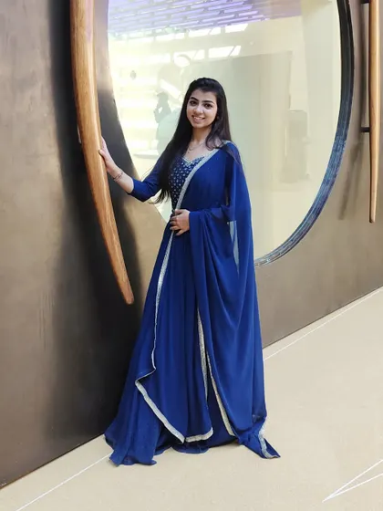 'Ek ladki ko dekha to aisa laga'. A playful, full-length shot in a beautiful blue outfit.