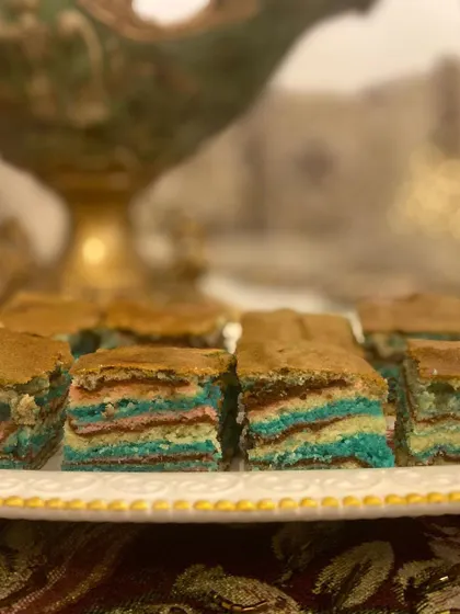 My Ribbon Cake is as fun to look at as it is to eat. It's super moist and fluffy, with colorful layers that make it a perfect tea cake or party treat.