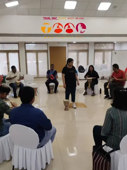 This is a classic view of our corporate leadership training in action. Seated in a circle, everyone is equal. We use group drumming metaphors to explore team dynamics, communication, and shared goals in a way that is engaging and genuinely fun.