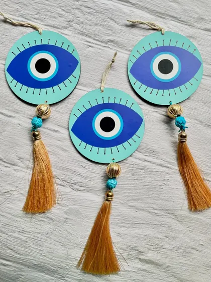 Decorative Evil Eye hangings to protect your home and bring good luck. These were recently made for a client and feature beautiful tassels.