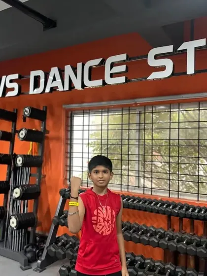 Ayush proudly displays his yellow band after a top performance in the basic level. Congratulations on your hard work.